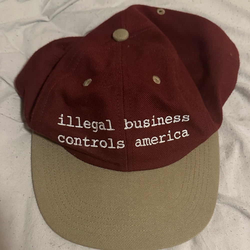 supreme illegal business controls America hat (rage against the machine parody)
